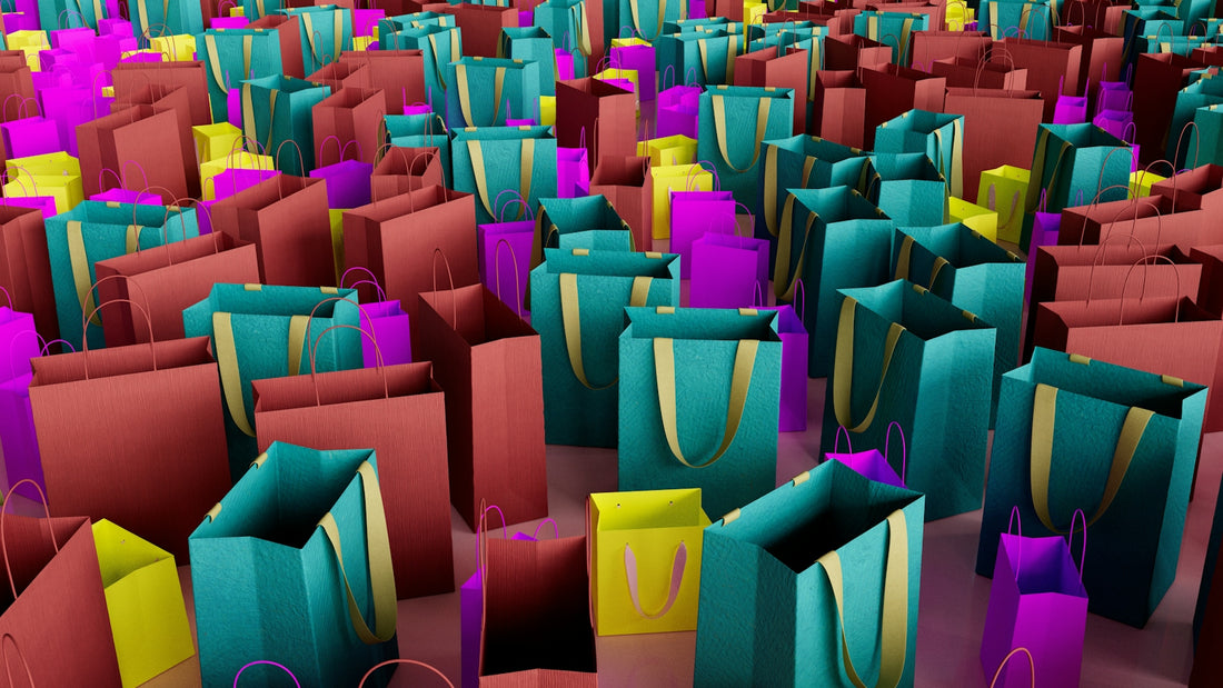 Colorful shopping bags are packed closely together