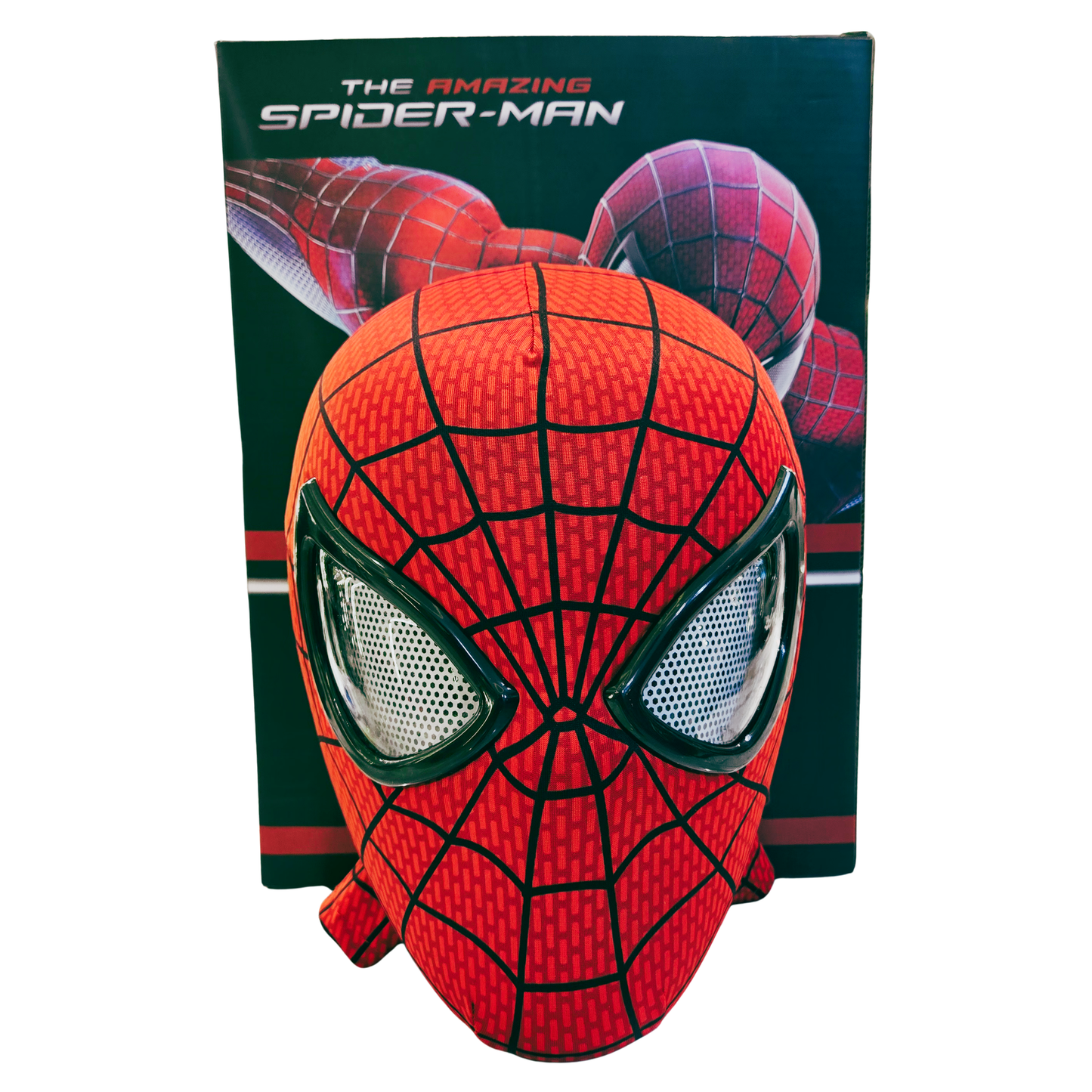 A red and black Spider-Man mask in front of its retail box, which features 'The Amazing Spider-Man' branding and an illustration of Spider-Man.